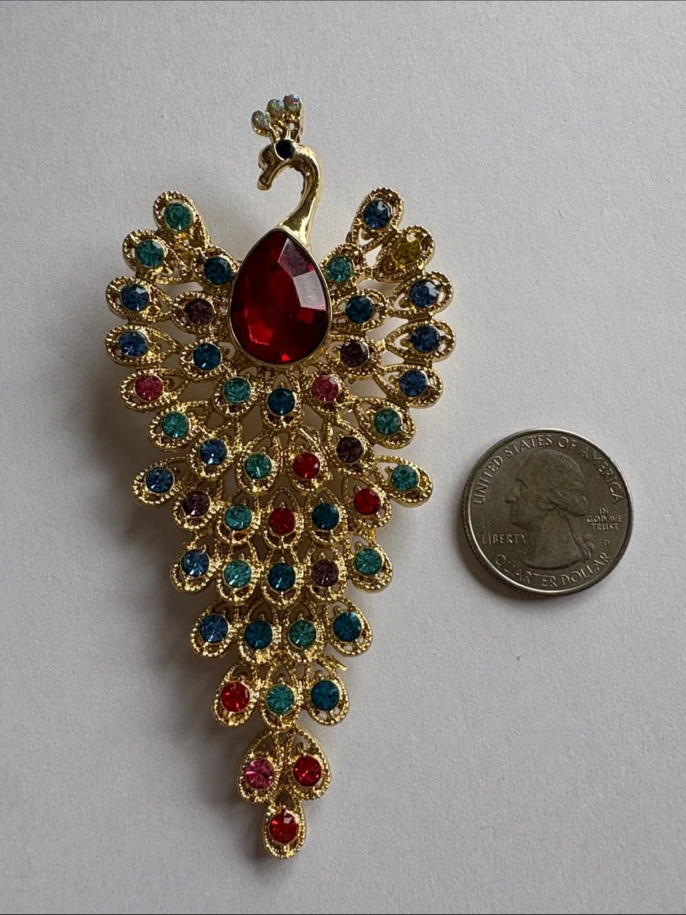 Gold Peacock Brooch with Multicolor and Red Center